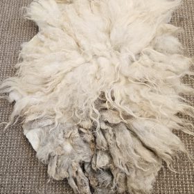 Skudde vachtje crème/grijs